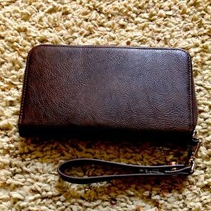 Thirty-one wallet with wrist strap.